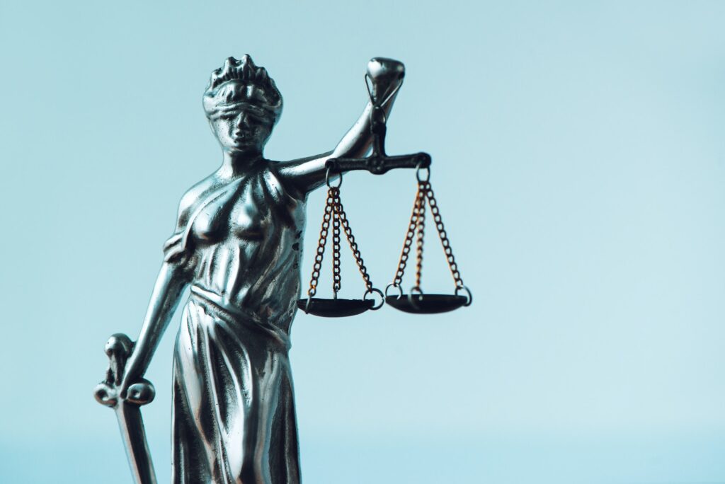 Lady Justice statue in law firm office